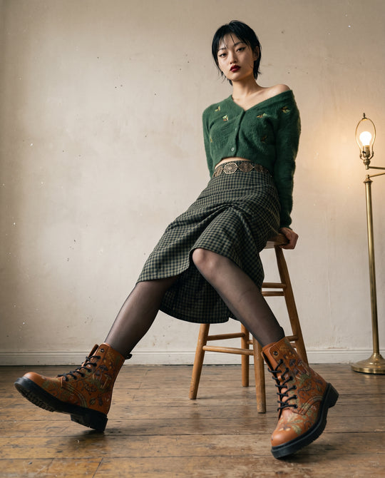 Model wearing Salamander Gaze Boots, studio