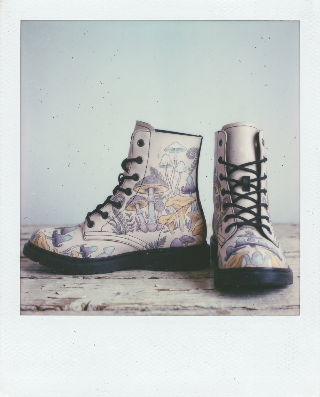 Witching Spores Boots, polaroid still on a whitewashed surface