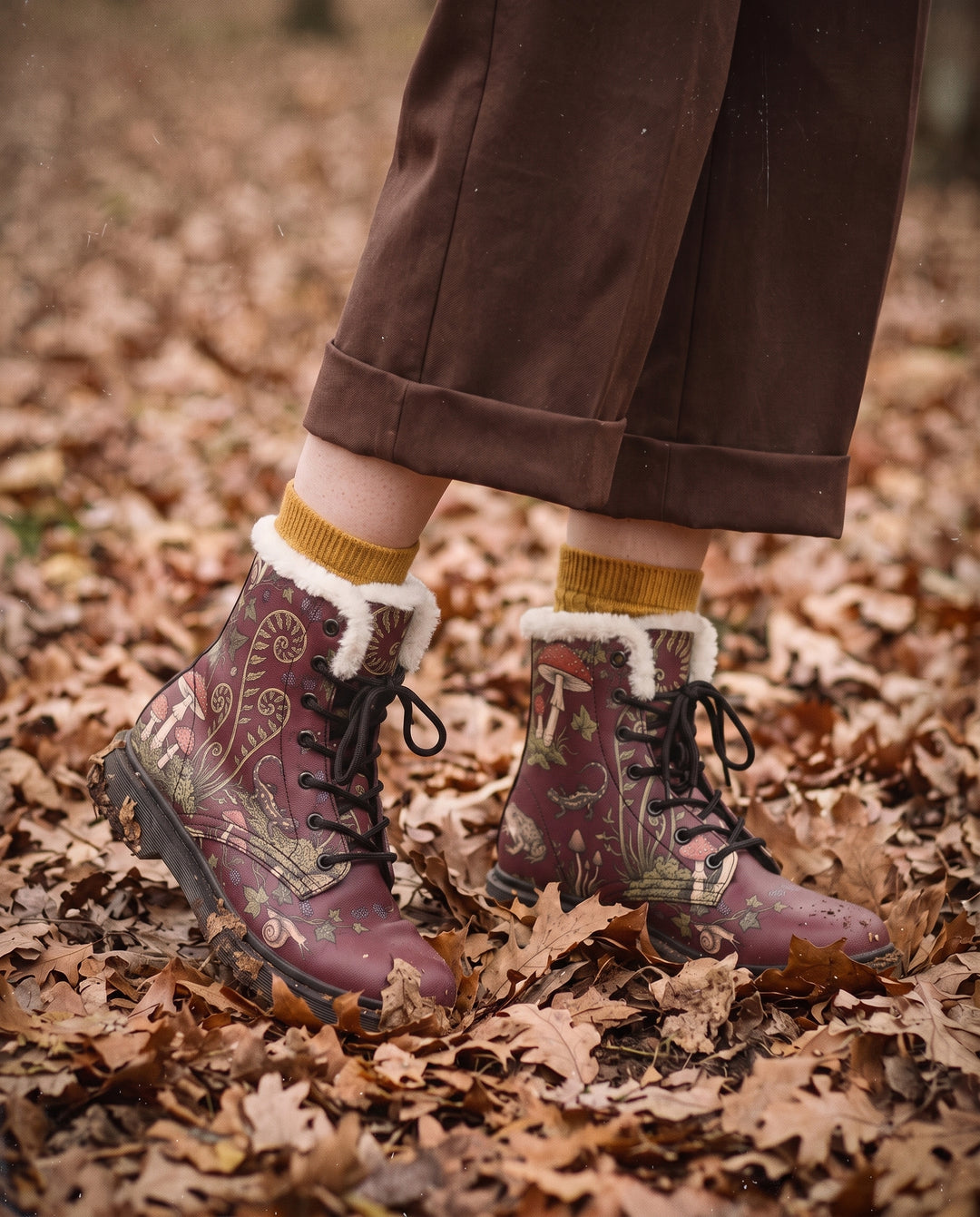 Fern Frenzy Winter Boots worn, standing in fallen leaves