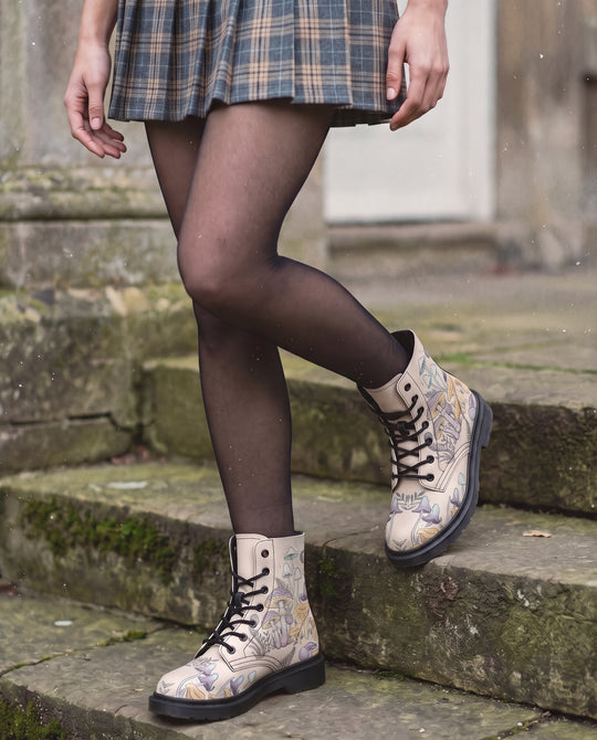 Witching Spores Boots worn on stone steps, below-knee