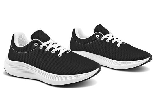 Black and white running shoes on a white background