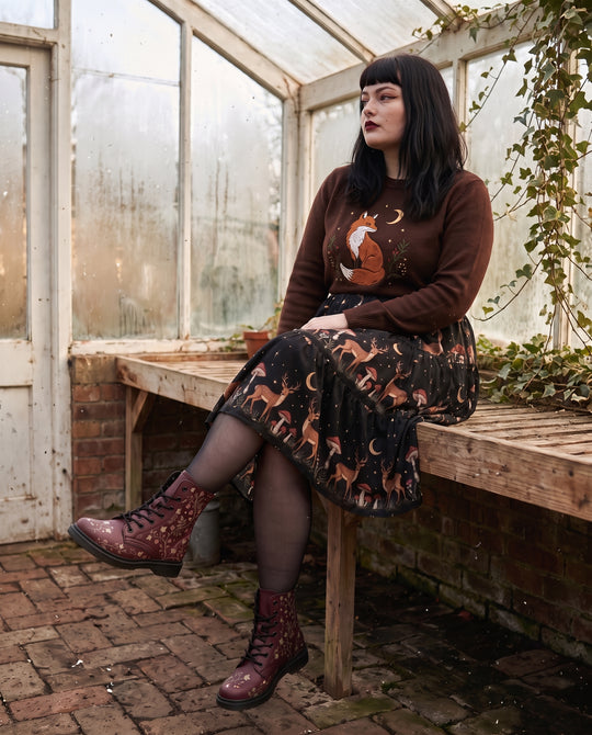 Cursed Rosebud Boots worn in an old greenhouse
