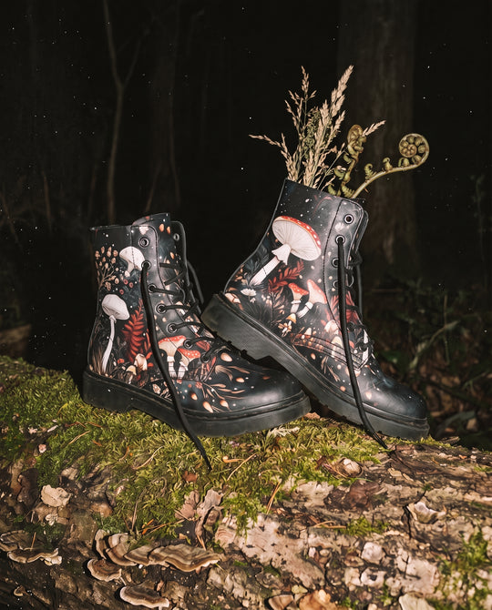 Faery Fungi Boots on a mossy log with dried grasses tucked into one boot